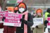 RUTH BONNEVILLE / FREE PRESS
                                Healthcare workers picketing outside 1010 Sinclair street Wednesday during the largest health care strike in Manitoba in over a decade.