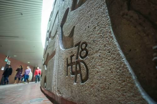 RUTH BONNEVILLE / FREE PRESS
                                The late Bruce Head&rsquo;s signature adorns The Wall, the massive career-defining concrete artwork he created for the underground concourse at Portage and Main.