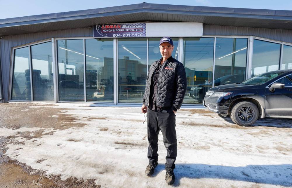 MIKE DEAL / FREE PRESS
                                A blown tire could set a driver back about $200 to $300, Robie Wong, owner of Urban Garage said.