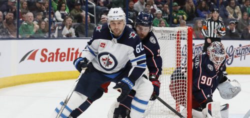 Winnipeg Jets&rsquo; Nino Niederreiter (62) controls the puck as Columbus Blue Jackets&rsquo; Ivan Provorov defends (9) during the third period of an NHL hockey game Sunday, March 17, 2024, in Columbus, Ohio. (AP Photo/Jay LaPrete)