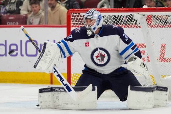 Hellebuyck’s first NHL game came on Nov. 27 of 2015 against the Minnesota Wild. (Erin Hooley / The Associated Press files)