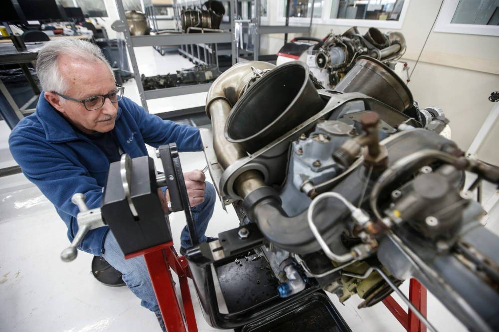 JOHN WOODS / FREE PRESS
Walter Peter, senior inspector technician, tears apart a Rolls Royce 250 C20B helicopter engine at Cadorath, in Winnipeg Monday. The locally-owned aerospace parts manufacturer has secured a multi-million dollar contract to repair and overhaul Rolls Royce helicopter engines.