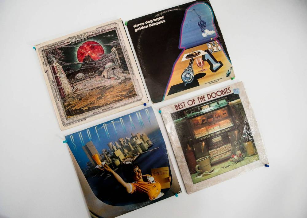 JOHN WOODS / FREE PRESS 
                                Record sleeves decorate Soloway’s wall.