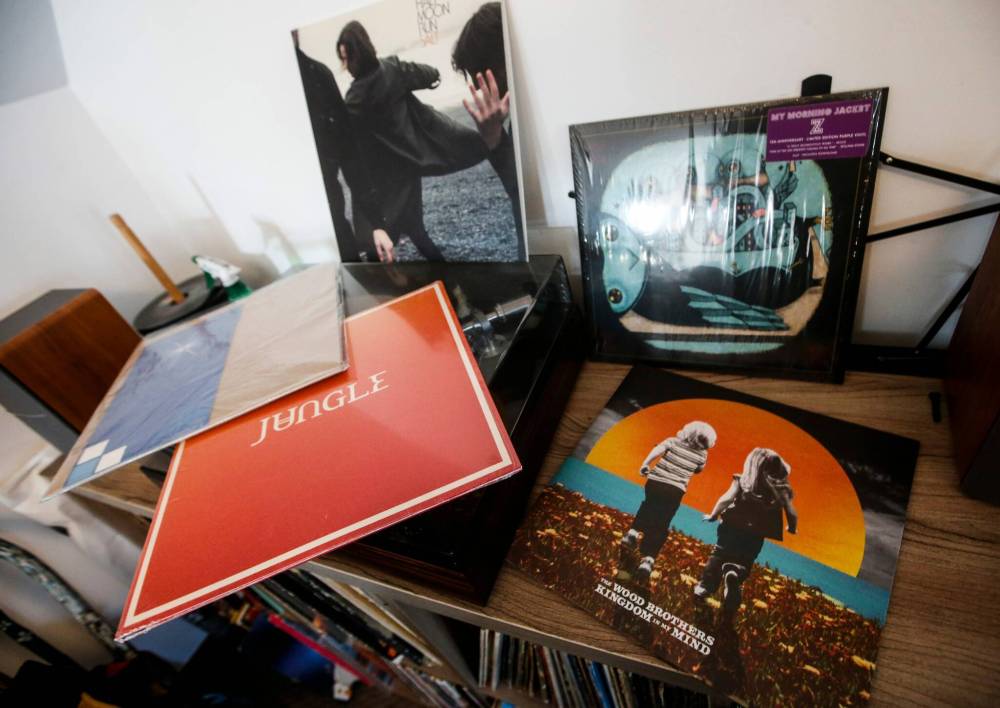 JOHN WOODS / FREE PRESS
                                The record club has been meeting for five years.