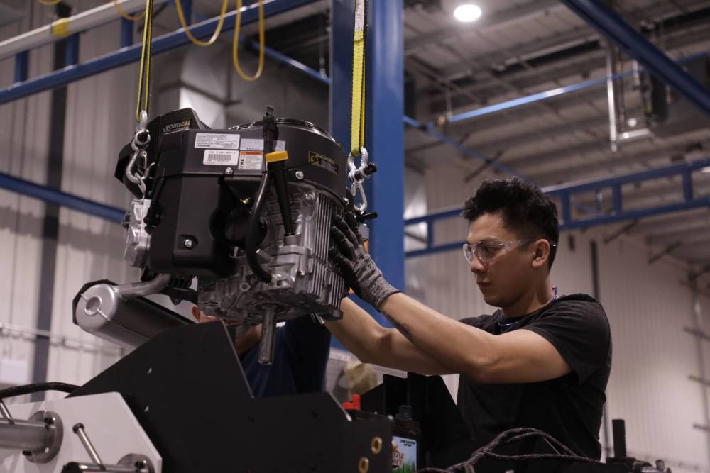 SUPPLIED
Yakta employees build zero-turn mowers in an RM of Woodlands facility.