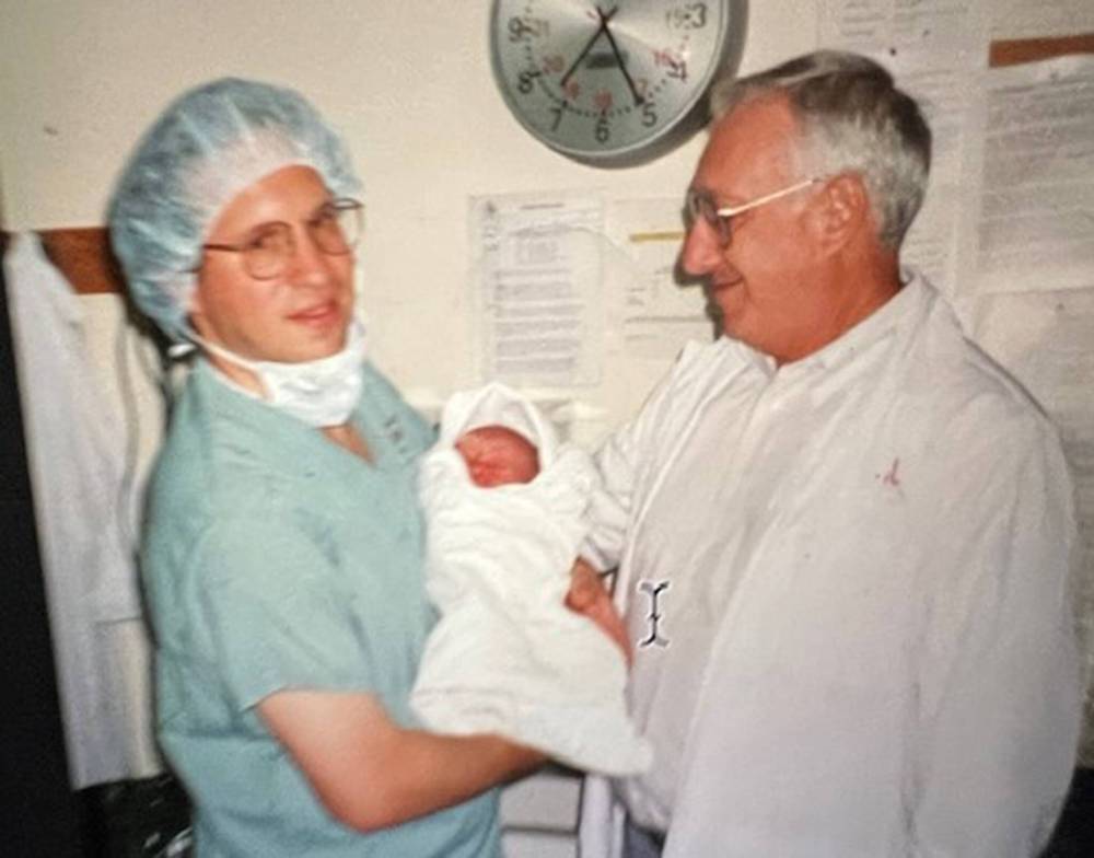 SUPPLIED
Dr. Philip Barnes delivered hundreds if not thousands of babies throughout his career. He’s pictured here with his son Ian (left) at the birth of his grandson Matthew.
