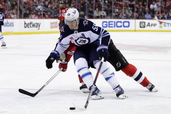 Since reuniting with Nikolaj Ehlers and Gabriel Vilardi, Mark Scheifele has had trouble putting numbers up on the board in the last three games. (Adam Hunger / The Associated Press files)
