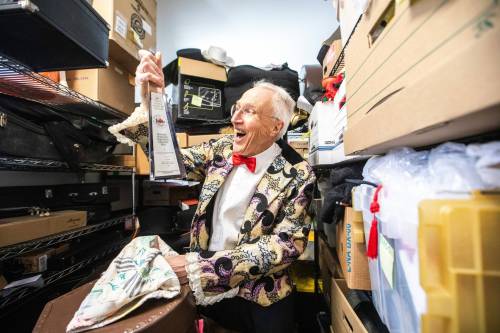 MIKAELA MACKENZIE / FREE PRESS
                                Performer Al Simmons takes his 1996 Juno award for Best Children&rsquo;s Album out of its quilted bag in his storage room.