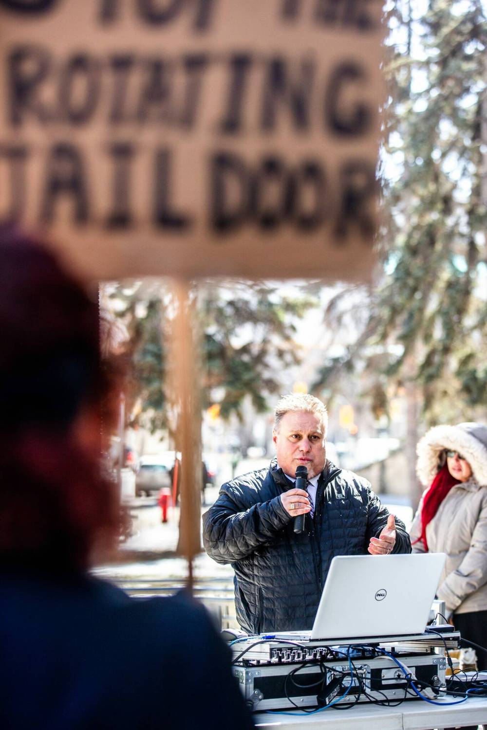 MIKAELA MACKENZIE / FREE PRESS Mike Vogiatzakis speaks at a rally calling for an end to the c;atch and release justice system outside of the Law Courts in Winnipeg on Friday, March 22, 2024.