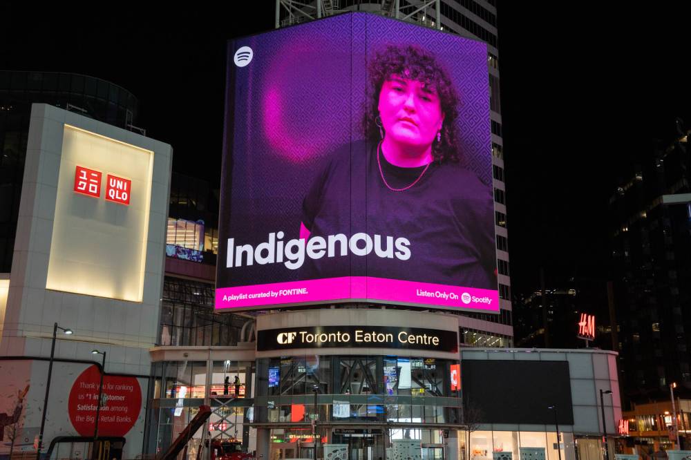 SUPPLIED
An image of Fontine looms over the intersection of Yonge and Dundas in Toronto advertising her curated Indigenous playlist on Spotify this month.