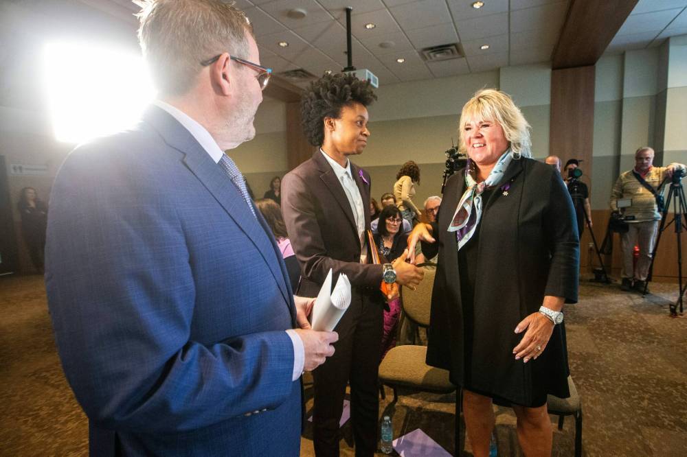 Health minister Uzoma Asagwara (centre) chats with Health Sciences Centre Foundation president and CEO Jonathon Lyon (left) and Health Sciences Centre Foundation board chair Tina Jones after announcing a new adult epilepsy monitoring unit at the Health Sciences Centre on Tuesday. (Mikaela MacKenzie / Free Press)
