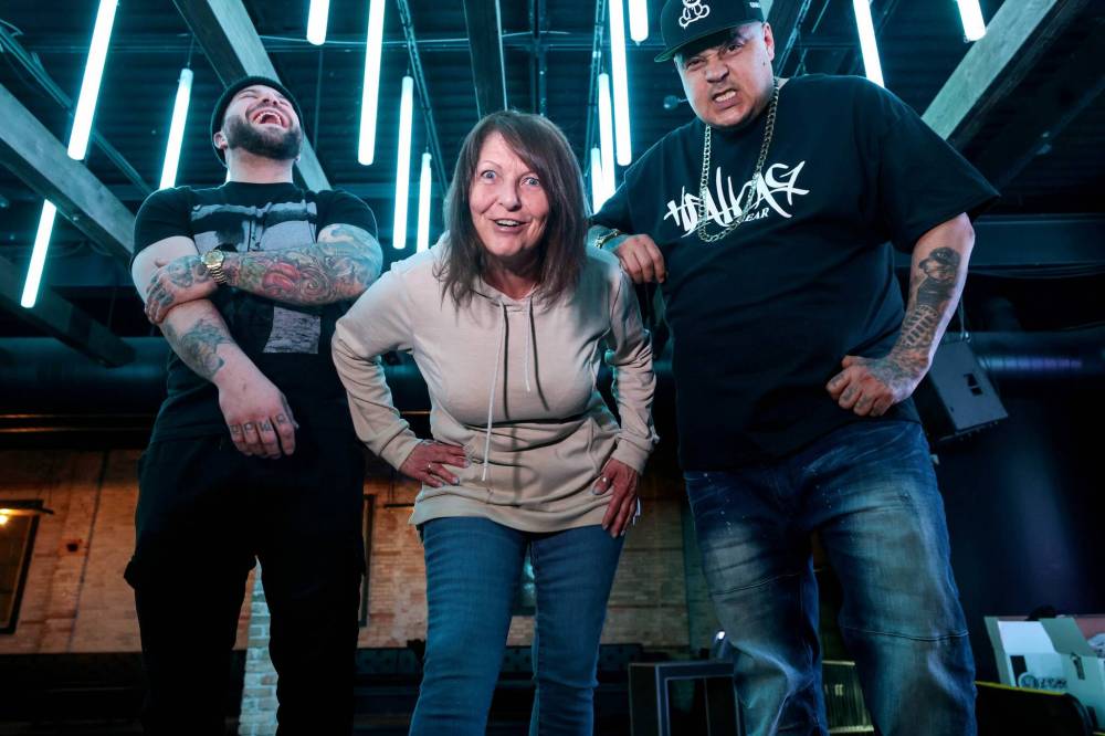 Ruth Bonneville / Free Press
Lori Prefontaine (centre), mother of the late rapper Jamie Prefontaine (Brooklyn), gave her blessing for the reunion of Winnipeg’s Most, Tyler Rogers (a.k.a. Charlie Fettah, left) and Billy Pierson (a.k.a. Jon-C).