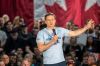 BROOK JONES / FREE PRESS Conservative Party of Canada Leader Pierre Poilievre points to a projection screen with a coutdown clock which reads Stop Trudeau's April 1st Tax Hikes during his 'Spike the Hike - Axe the Tax' rally at the RBC Convention Centre in Winnipeg, Man., Thursday, March 28, 2024.