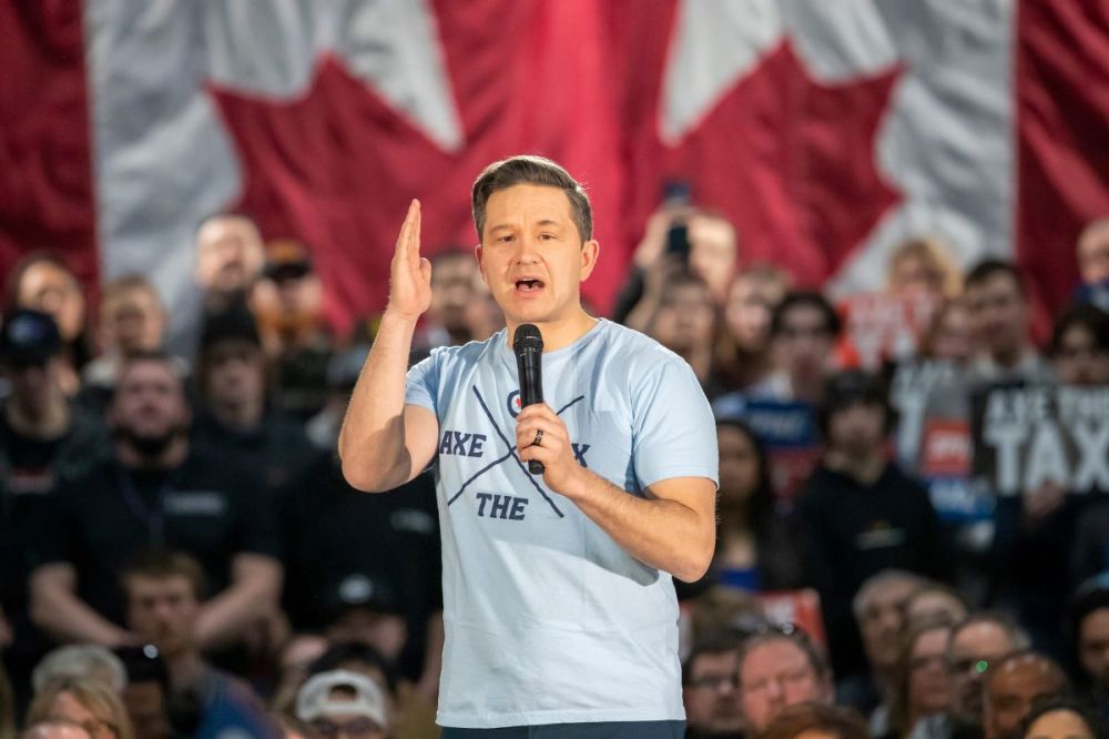 BROOK JONES / FREE PRESS Conservative Party of Canada Leader Pierre Poilievre talks to a large crowd of supporters during his 'Spike the Hike - Axe the Tax' rally at the RBC Convention Centre in Winnipeg, Man., Thursday, March 28, 2024.