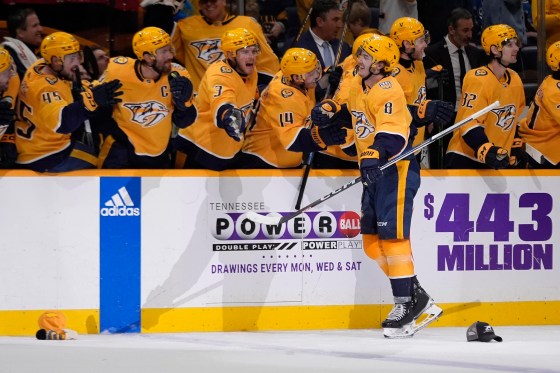 Cody Glass celebrates his hat trick against the Colorado Avalanche on Saturday with his teammates in Nashville, Tenn. (George Walker IV / The Associated Press files)