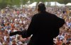 MIKE APORIUS/WINNIPEG FREE PRESS Richie Havens is silouetted(spelling???) by the setting sun on the Main Stage Sunday evening for the last night of Folk Fest. July 14/2002