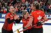 Canada skip Rachel Homan, left, celebrates with teammates Tracy Fleury, Sarah Wilkes and Emma Miskew after defeating Switzerland's Silvana Tirinzoni rink at the World Women's Curling Championship gold medal game in Sydney, N.S. on Sunday, March 24, 2024. (Frank Gunn / The Canadian Press)