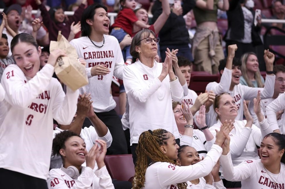 Stanford basketball head coach Tara VanDerveer, center, applauds as the team is named a No. 2 seed in the NCAA Tournament, Sunday, March 17, 2024, in Stanford, Calif. (Scott Strazzante/San Francisco Chronicle via AP)
