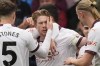 Manchester City's Kevin De Bruyne, centre, celebrates with teammates after scoring his side's first goal during the English Premier League soccer match between Crystal Palace and Manchester City at Selhurst Park stadium in London, Saturday, April 6, 2024.(AP Photo/Frank Augstein)