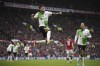 Liverpool's Luis Diaz, centre, celebrates after scoring the opening goal during the English Premier League soccer match between Manchester United and Liverpool at the Old Trafford stadium in Manchester, England, Sunday, April 7, 2024. (AP Photo/Dave Thompson)