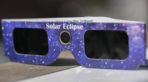Though people in Newfoundland and Labrador’s capital city woke up to snow and fog this morning, residents of Burgeo, N.L., were looking up at clear blue skies as they prepared their solar eclipse celebrations. A pair of NASA-approved solar eclipse glasses are shown in Montreal, Tuesday, April 2, 2024. THE CANADIAN PRESS/Graham Hughes