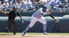 Kansas City Royals first baseman Salvador Perez goes after a misplayed ground ball hit by Chicago White Sox' Robbie Grossman during the first inning of a baseball game in Kansas City, Mo., Sunday, April 7, 2024. Grossman was out on the play. (AP Photo/Colin E. Braley)