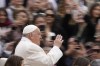 Pope Francis waves to the faithful as he arrives for his weekly general audience in St. Peter's Square, at the Vatican, Wednesday, April 3, 2024. A leading Canadian LGBTQ+ rights group says the Vatican's declaration that gender-affirming surgery and surrogacy are violations of human dignity is