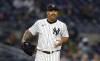 New York Yankees pitcher Nestor Cortes smiles before throwing against the Miami Marlins during the seventh inning of a baseball game, Monday, April 8, 2024, in New York. (AP Photo/Noah K. Murray)