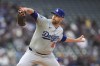 Los Angeles Dodgers starting pitcher James Paxton (65) delivers during the first inning of a baseball game against the Minnesota Twins, Monday, April 8, 2024, in Minneapolis. (AP Photo/Abbie Parr)