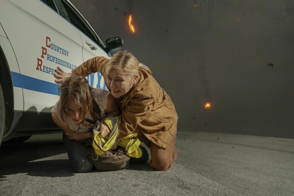 This image released by A24 shows Cailee Spaeny, left, and Kirsten Dunst in a scene from