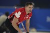 John Morris, of Canada, yells to his teammate after he throws a rock during the mixed doubles curling match against the Czech Republic at the Beijing Winter Olympics on Monday, Feb. 7, 2022, in Beijing. A group that includes two-time Olympic gold medal curler Morris and former NFL player Jared Allen has purchased the Grand Slam of Curling tour from Sportsnet. THE CANADIAN PRESS/AP/Brynn Anderson