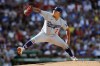 FILE - Los Angeles Dodgers starting pitcher Julio Urias pitches during the first inning of a baseball game against the Boston Red Sox, Aug. 26, 2023, in Boston. The former Los Angeles Dodgers pitcher Urías has been charged with five misdemeanors stemming from his his arrest last September on suspicion of domestic violence, authorities said Tuesday April, 9, 2024. (AP Photo/Michael Dwyer, File)