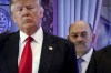 FILE - Allen Weisselberg, right, stands behind then President-elect Donald Trump during a news conference in the lobby of Trump Tower in New York, Jan. 11, 2017. Weisselberg, a former longtime executive in Donald Trump’s real estate empire, is set to be sentenced for lying under oath in the ex-president’s New York civil fraud case. Weisselberg is expected to be sentenced Wednesday to five months in jail after pleading guilty last month to two counts of perjury. (AP Photo/Evan Vucci, File)