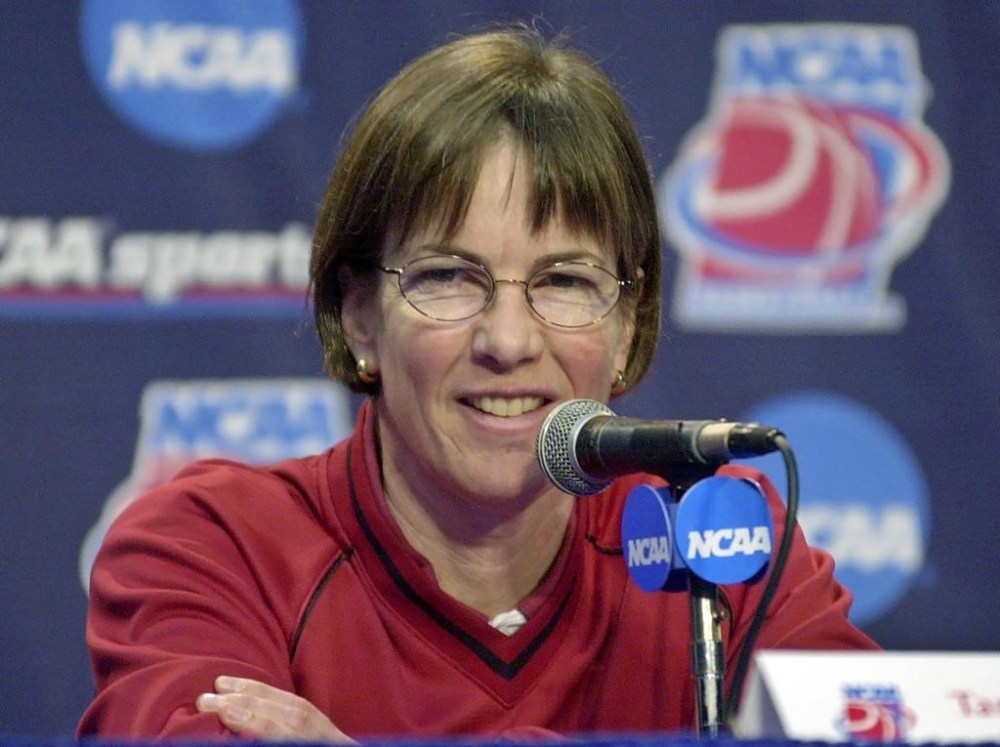 FILE - Stanford head coach Tara VanDerveer smiles during a news conference in Stanford, Calif., Sunday, March 23, 2003. VanDerveer, the winningest basketball coach in NCAA history, announced her retirement Tuesday night, April 9, 2024, after 38 seasons leading the Stanford women’s team and 45 years overall. (AP Photo/Paul Sakuma, File)