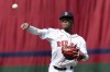 Boston Red Sox's Ceddanne Rafaela warms up before an opening-day baseball game against the Baltimore Orioles at Fenway Park, Tuesday, April 9, 2024, in Boston. The Red Sox finalized an eight-year contract Wednesday, April 10, 2024, with 23-year-old Ceddanne Rafaela, the youngest player on their roster. The deal includes a team option for 2032. (AP Photo/Michael Dwyer, File)