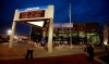 FILE - The marquee in front of the Energy Solutions Arena, formerly the Delta Center, home of the Utah Jazz, shows conflicting signage at dusk before a game against the Toronto Raptors, Monday, Nov. 20, 2006, in Salt Lake City. Preparations are being made in case an NHL team is in Salt Lake City sooner than later. Prospective owner Ryan Smith earlier this week solicited public suggestions for a team name. All this comes as the Arizona Coyotes are hoping to win a land auction for a site to build a new arena in the city of Phoenix. (AP Photo/Steve C. Wilson, File)