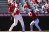 Los Angeles Angels designated hitter Mike Trout hits a double during the third inning of a baseball game against the Tampa Bay Rays, Wednesday, April 10, 2024, in Anaheim, Calif. (AP Photo/Ryan Sun)