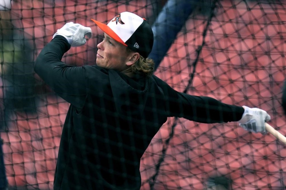 Baltimore Orioles' Jackson Holliday takes a swing during batting practice prior to his first major league baseball game against the Boston Red Sox, Wednesday, April 10, 2024, in Boston. Holliday, the son of seven-time All-Star Matt Holliday, is schedule to play second base in Wednesday game. (AP Photo/Charles Krupa)