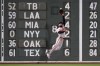 Baltimore Orioles outfielder Colton Cowser makes the catch on a fly out by Boston Red Sox's Romy Gonzalez during the eighth inning of a baseball game, Wednesday, April 10, 2024, in Boston. (AP Photo/Charles Krupa)
