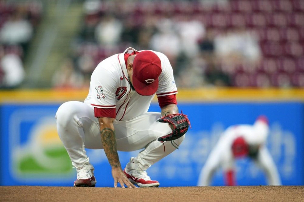 Cincinnati Reds pitcher Frankie Montas stretches prior to a baseball game against the Milwaukee Brewers Tuesday, April 9, 2024, in Cincinnati. (AP Photo/Jeff Dean)