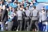 Burnley's head coach Vincent Kompany, in cap at centre, reacts after his is shown a red card during the English Premier League soccer match between Chelsea and Burnley at Stamford Bridge in London, Saturday, March 30, 2024. (AP Photo/Kin Cheung)