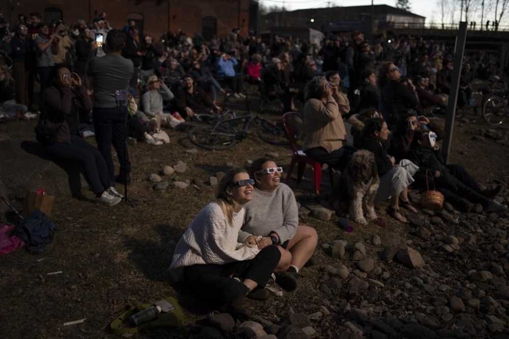 CBC says it attracted Canada's largest TV audiences for its broadcast of Monday's total solar eclipse. Skywatchers react to viewing the totality phase of the solar eclipse in Fredericton, Monday, April 8, 2024. THE CANADIAN PRESS/Darren Calabrese