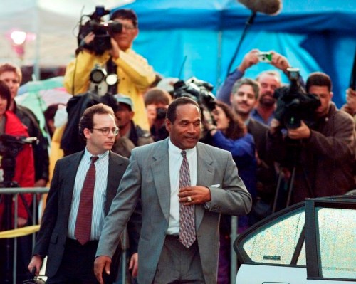 FILE - O.J. Simpson and his defense attorney Daniel Leonard leave Los Angeles County Superior court in Santa Monica, Calif., Friday, Nov. 22, 1996, after testifying in the wrongful death civil trial against him. Simpson, the decorated football superstar and Hollywood actor who was acquitted of charges he killed his former wife and her friend but later found liable in a separate civil trial, has died. He was 76. (AP Photo/Michael Caulfield, File)
