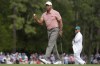 Tiger Woods waves after making a putt on the first hole during the first round at the Masters golf tournament at Augusta National Golf Club Thursday, April 11, 2024, in Augusta, Ga. (AP Photo/Ashley Landis)