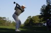Tiger Woods hits his tee shot on the 15th hole during the weather delayed first round at the Masters golf tournament at Augusta National Golf Club Friday, April 12, 2024, in Augusta, Ga. (AP Photo/George Walker IV)