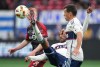 Vancouver Whitecaps' Fafa Picault, centre, gets his foot on the ball as Toronto FC's Matty Longstaff, back left, and Vancouver's Andres Cubas, front right, watch during first half MLS soccer action in Vancouver, B.C., Saturday, April 6, 2024. Last week, the Whitecaps climbed to the top of Major League Soccer’s Western Conference. This week, they're fighting to stay there.THE CANADIAN PRESS/Darryl Dyck
