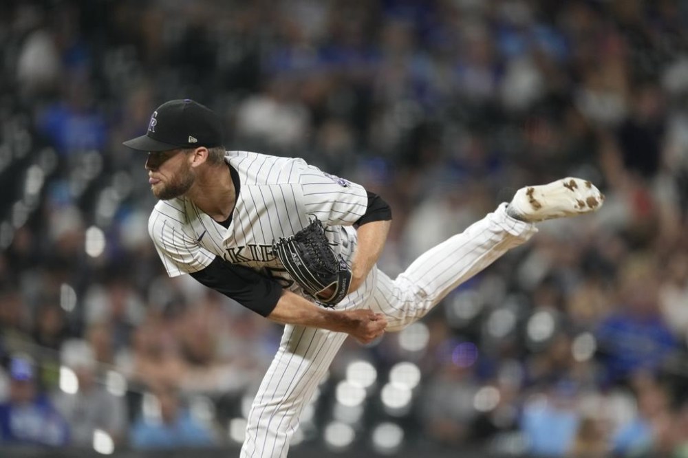 FILE - Colorado Rockies relief pitcher Daniel Bard delivers in the ninth inning of a baseball game against the Toronto Blue Jays, Sept. 1, 2023, in Denver. Colorado right-hander Bard needs surgery to repair the flexor tendon in his right elbow and will not pitch again this season, Rockies manager Bud Black said Friday, April 12, 2024. (AP Photo/David Zalubowski, File)