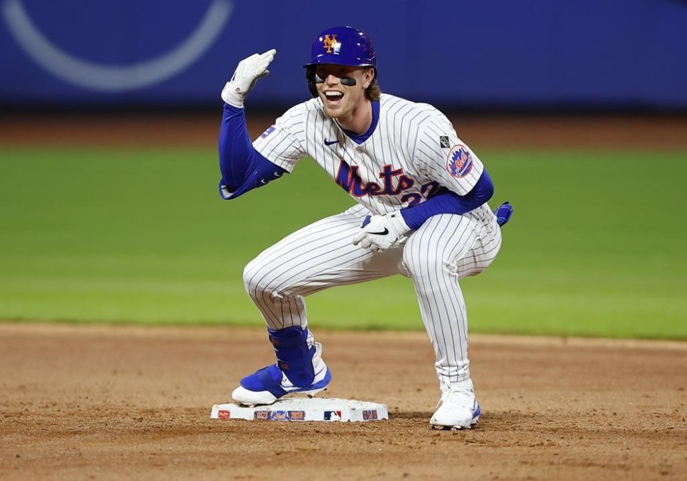 New York Mets' Brett Baty reacts after hitting a double against the Kansas City Royals during the fifth inning of a baseball game, Friday, April 12, 2024, in New York. (AP Photo/Noah K. Murray)