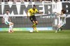 Dortmund's Sebastien Haller, center, controls the ball during the German Bundesliga soccer match between Borussia Moenchengladbach and Borussia Dortmund at the Borussia Park in Moenchengladbach, Germany, Saturday, April 13, 2024. (AP Photo/Martin Meissner)