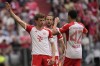 Bayern's Thomas Mueller, left, celebrates after scoring his side's second goal during the German Bundesliga soccer match between Bayern Munich and Cologne at the Allianz Arena in Munich, Germany, Saturday, April 13, 2024. (AP Photo/Matthias Schrader)